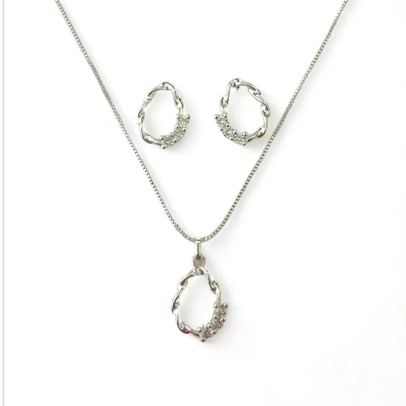 CONJUNTO OVAL TORCIDO VAZADO ZIRCONIA CRISTAL