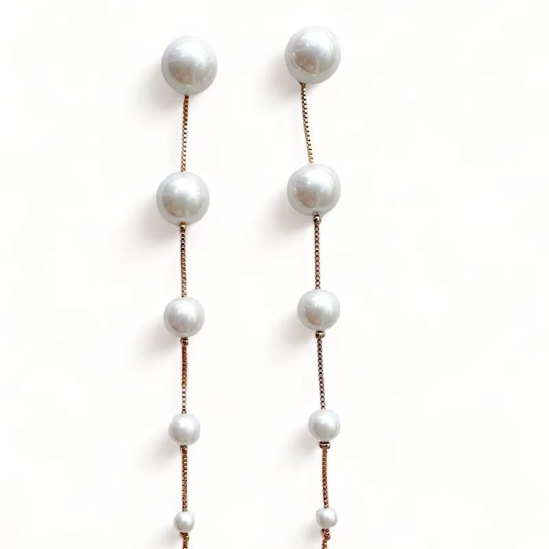 BRINCO PENDULO PEROLAS