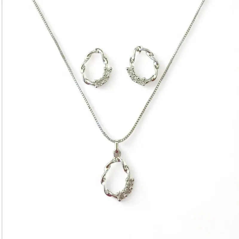 CONJUNTO OVAL TORCIDO VAZADO ZIRCONIA CRISTAL